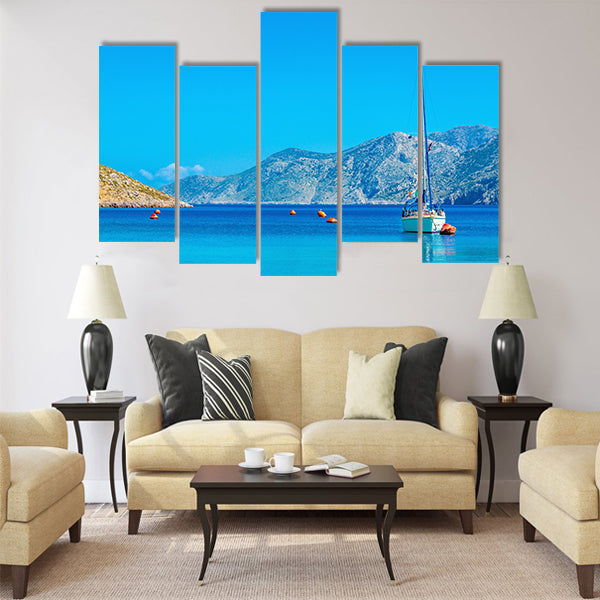 Sport yacht on anchor in silent bay on Greek Island Multi Panel Canvas Wall Art