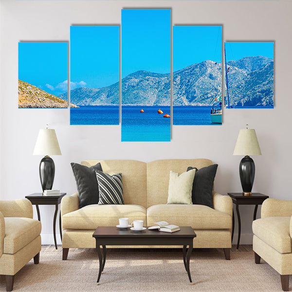 Sport yacht on anchor in silent bay on Greek Island Multi Panel Canvas Wall Art