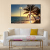 Palm tree on the tropical beach, sunrise shot Multi panel canvas wall art