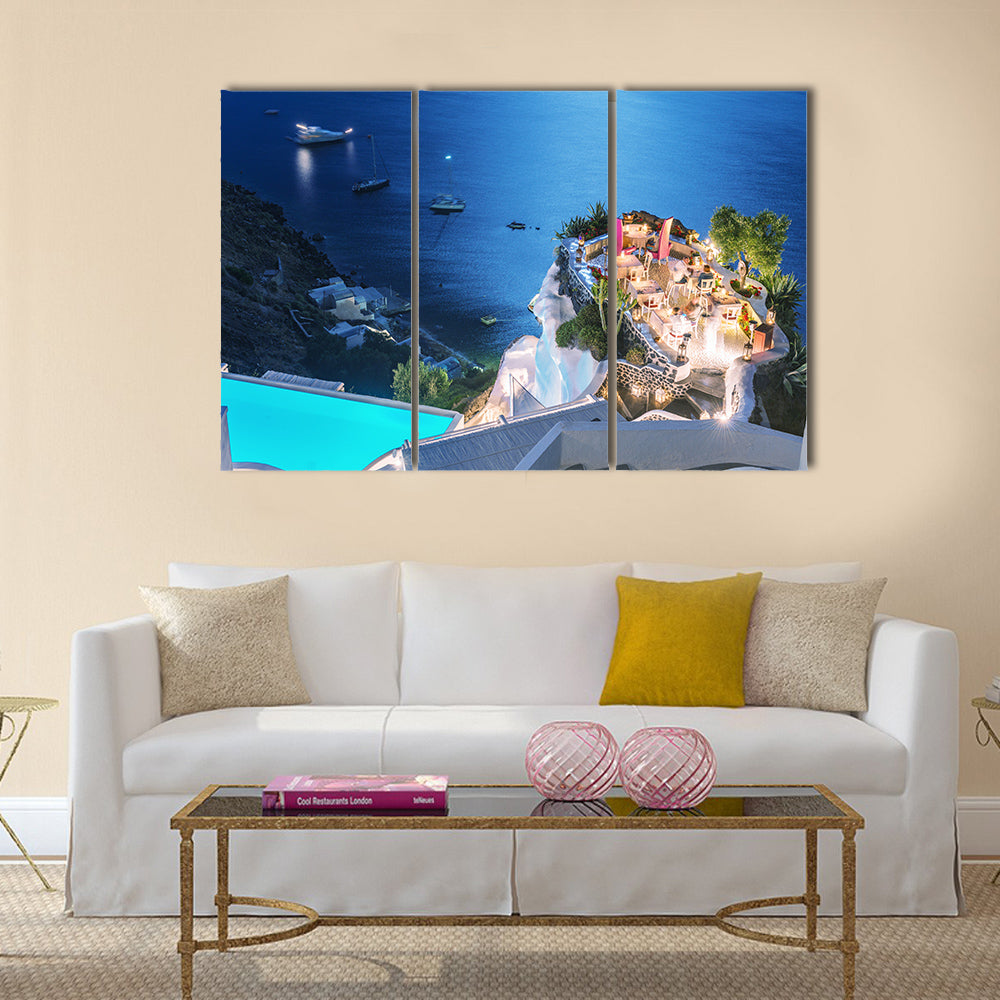 A Restaurant Terrace Over The Ocean At Night Multi Panel Canvas Wall Art