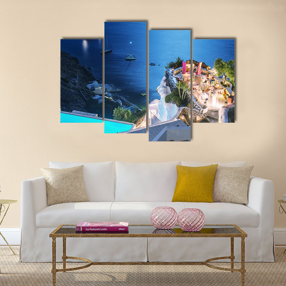 A Restaurant Terrace Over The Ocean At Night Multi Panel Canvas Wall Art