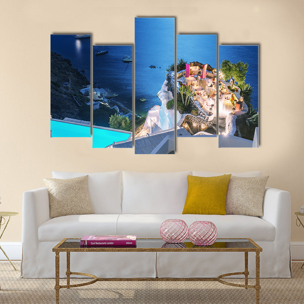 A Restaurant Terrace Over The Ocean At Night Multi Panel Canvas Wall Art