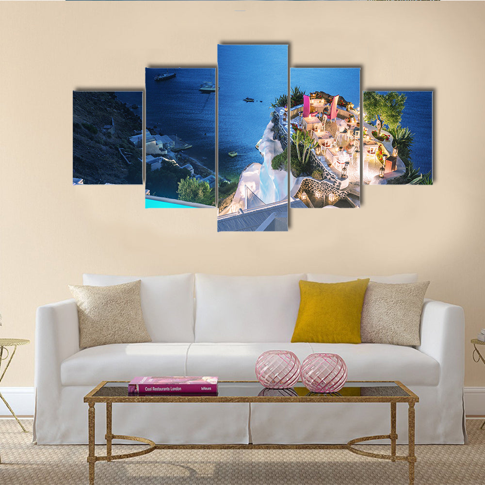 A Restaurant Terrace Over The Ocean At Night Multi Panel Canvas Wall Art