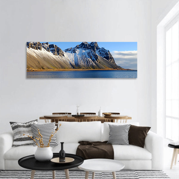 Cliff beside lake in Iceland panoramic canvas wall art