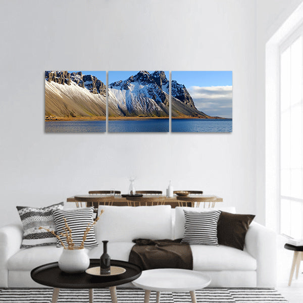 Cliff beside lake in Iceland panoramic canvas wall art