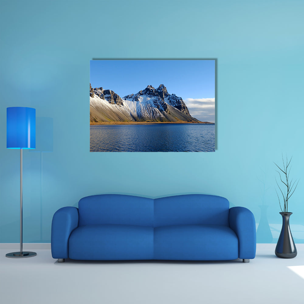 Cliff beside lake in Iceland multi panel canvas wall art