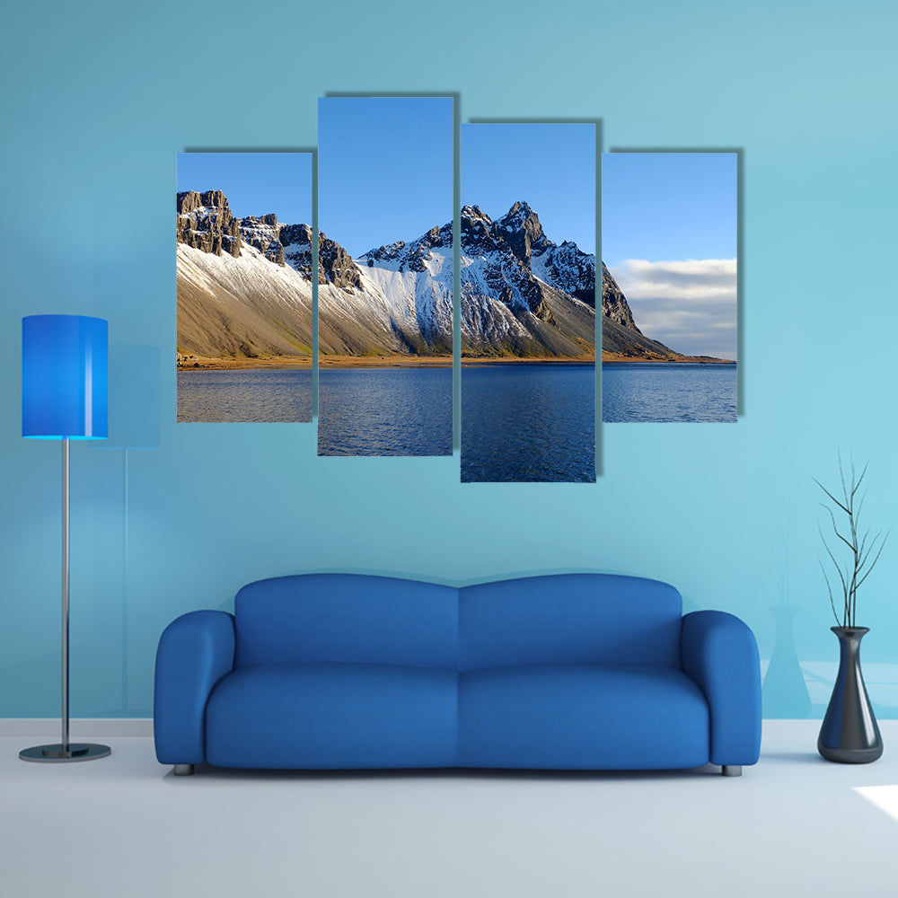 Cliff beside lake in Iceland multi panel canvas wall art