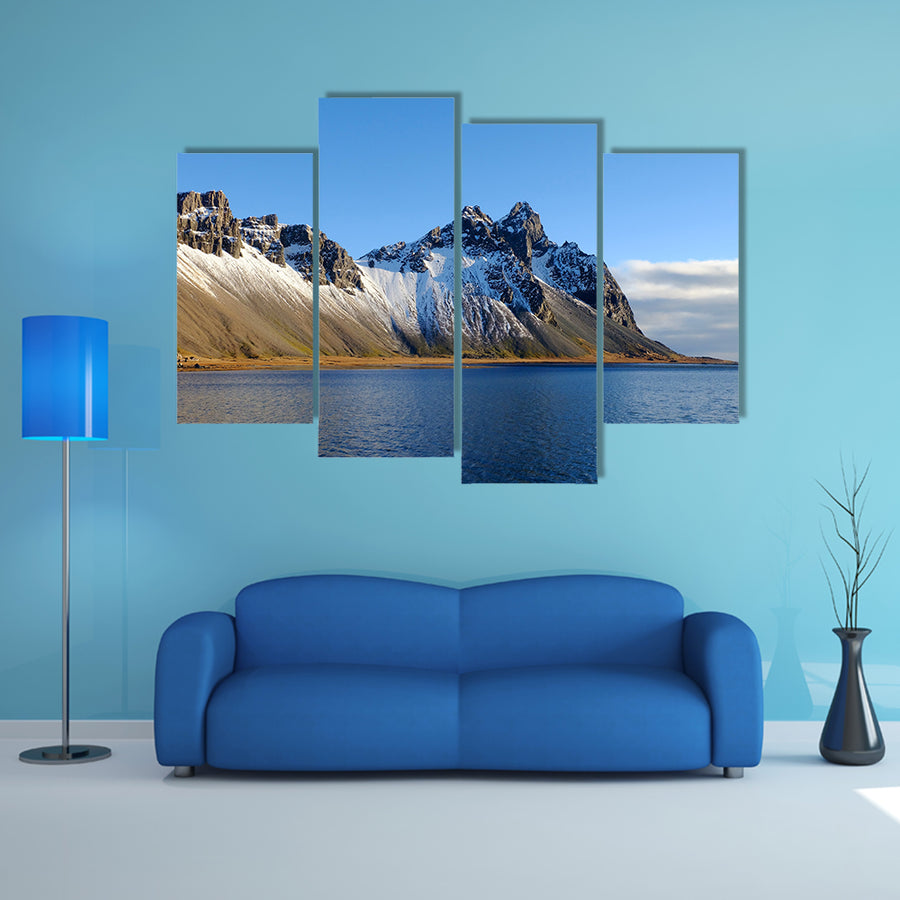 Cliff beside lake in Iceland multi panel canvas wall art
