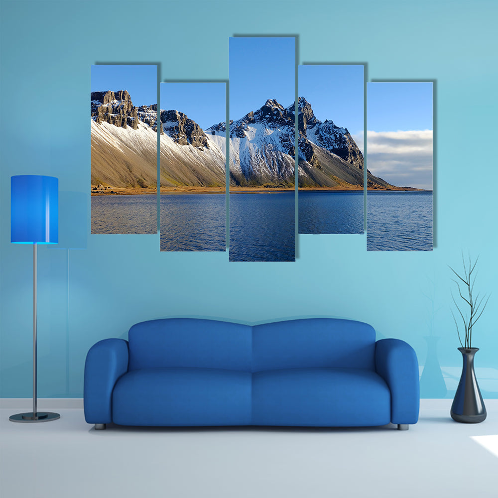 Cliff beside lake in Iceland multi panel canvas wall art