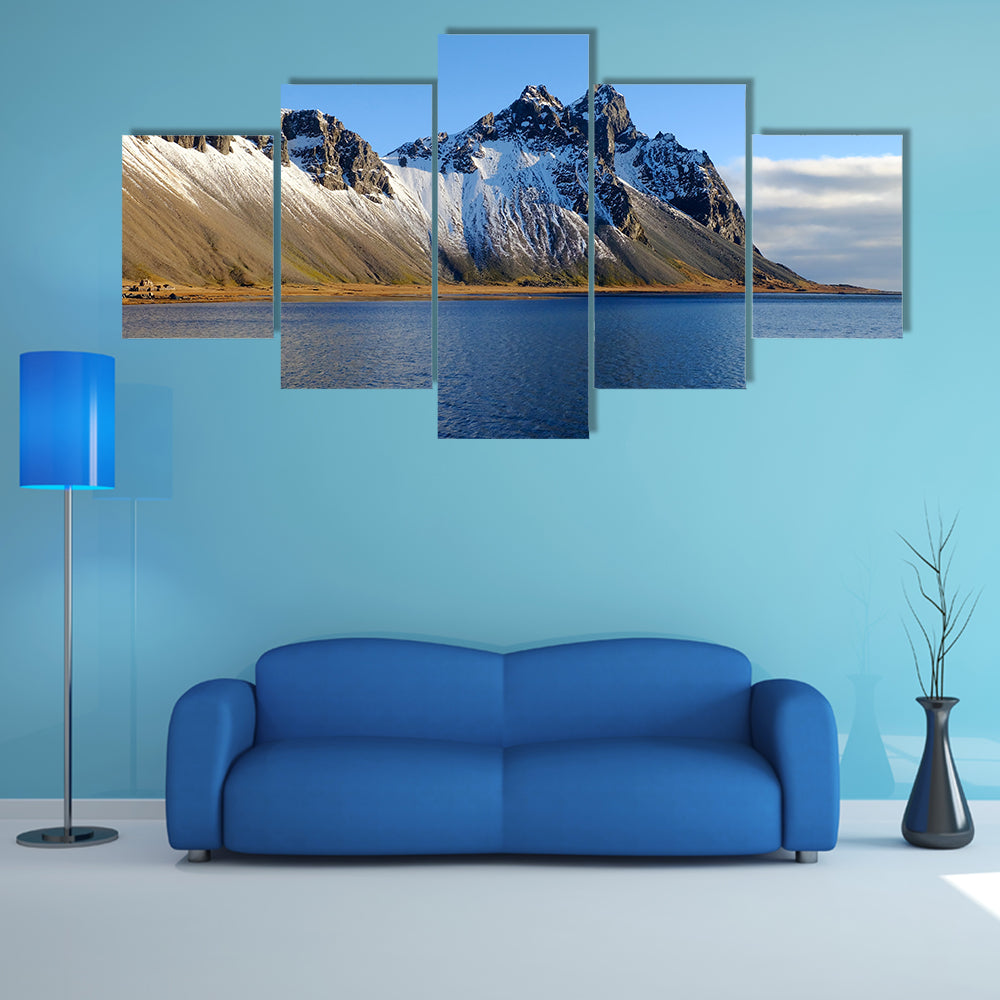 Cliff beside lake in Iceland multi panel canvas wall art