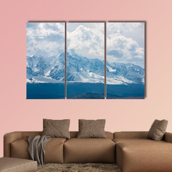 Mountain peaks in snow and white clouds multi panel canvas wall art