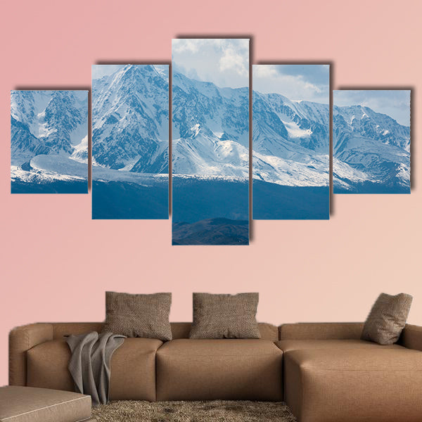 Mountain peaks in snow and white clouds multi panel canvas wall art