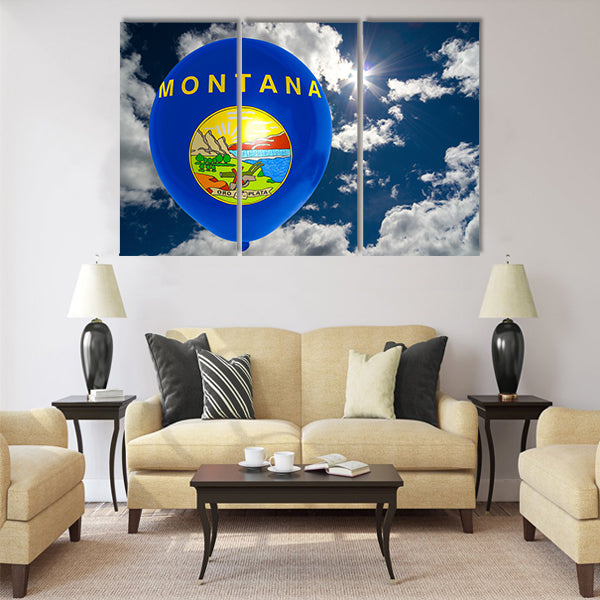 Balloon in colors of montana flag flying on blue sky Multi panel canvas wall art