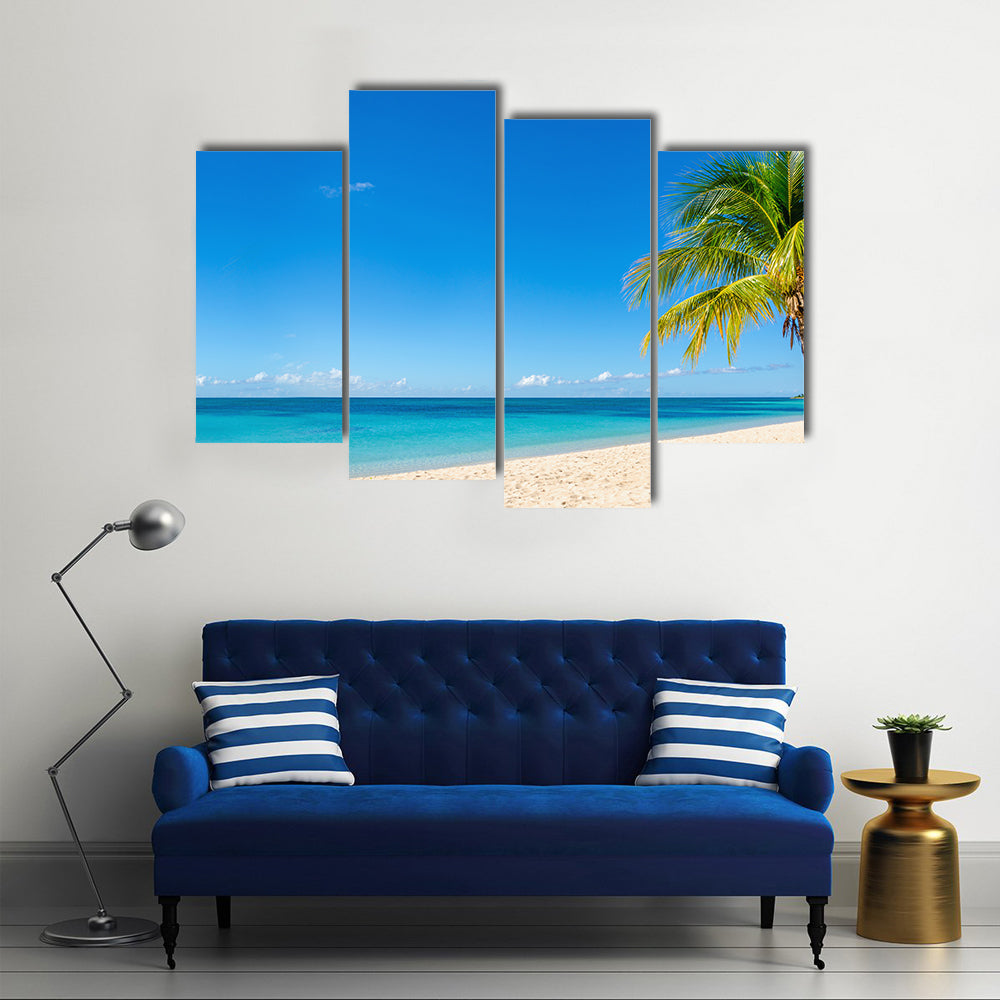 Amazing sandy beach with coconut palm tree and blue sky, Caribbean Islands multi panel canvas wall art