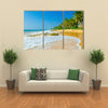 Amazing view of exotic sandy beach with high palm trees Multi panel canvas wall art