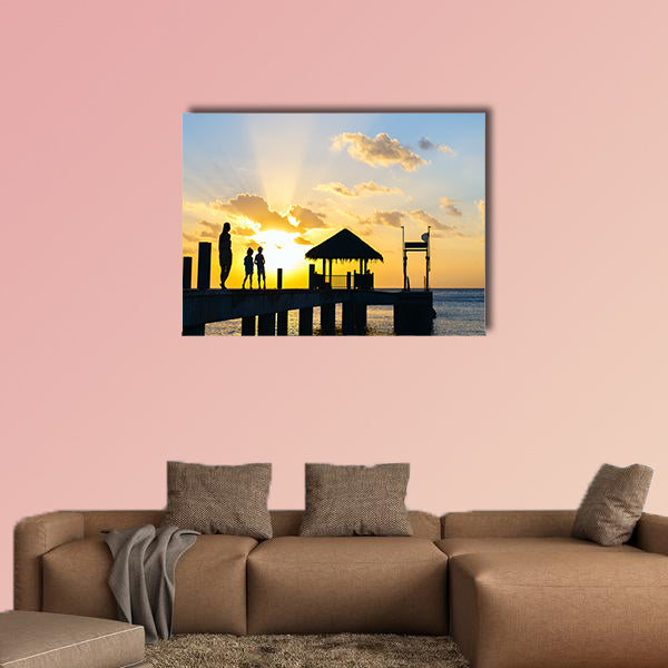 Family of mother and kids silhouettes at tropical coast wall art
