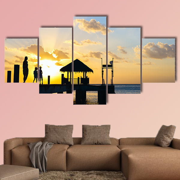 Family of mother and kids silhouettes at tropical coast wall art
