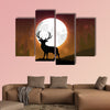 Silhouette of a deer standing on a hill at night multi panel canvas wall art