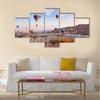 Hot air balloon flying over rock landscape at Cappadocia Turkey, multi panel canvas wall art