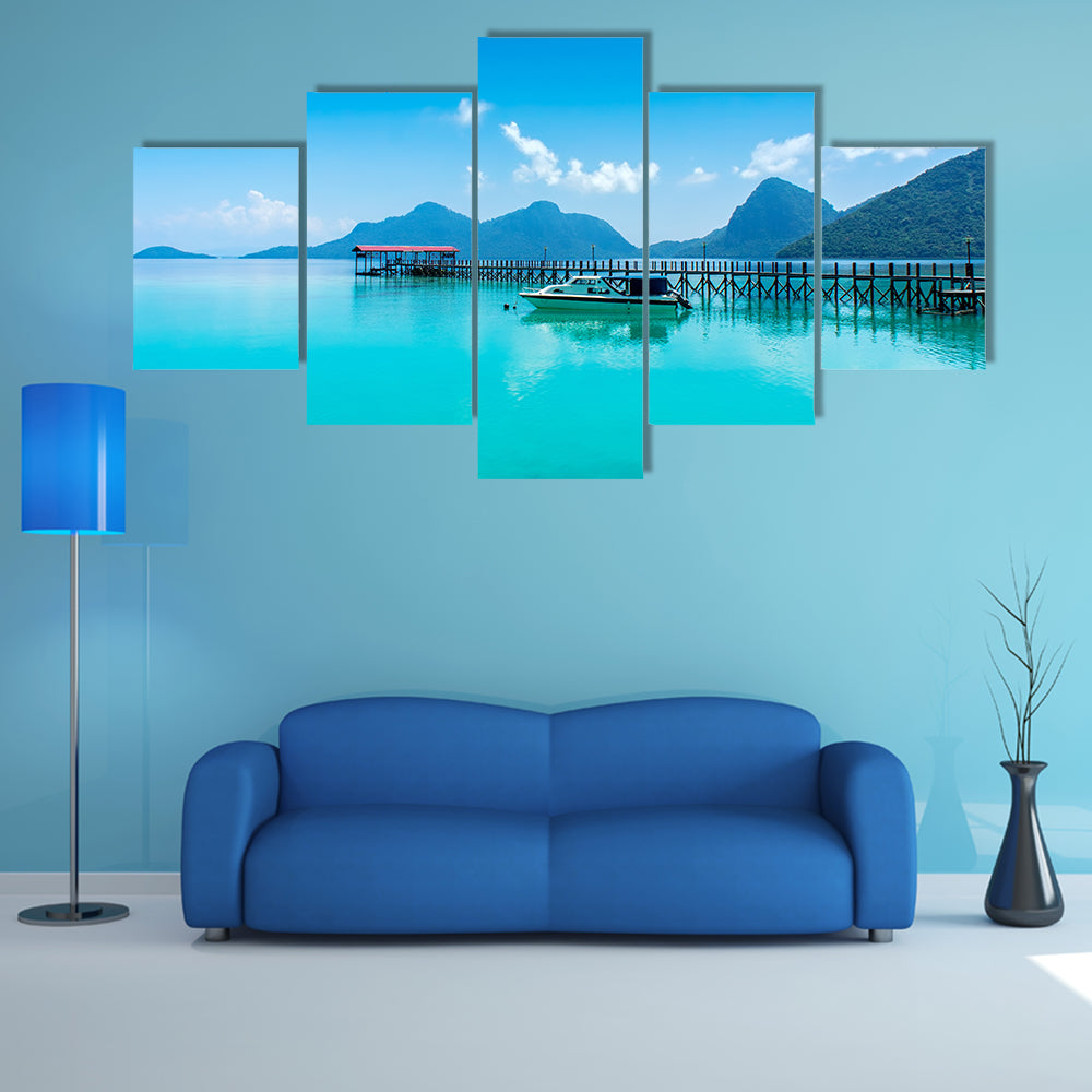 A wood jetty and speed boat at bohey dulang, semporna sabah Multi Panel Canvas Wall Art