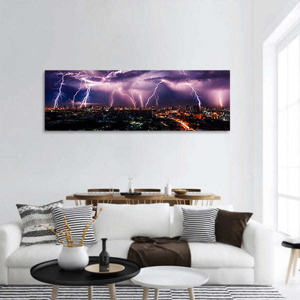 Lightning storm over city panoramic canvas wall art
