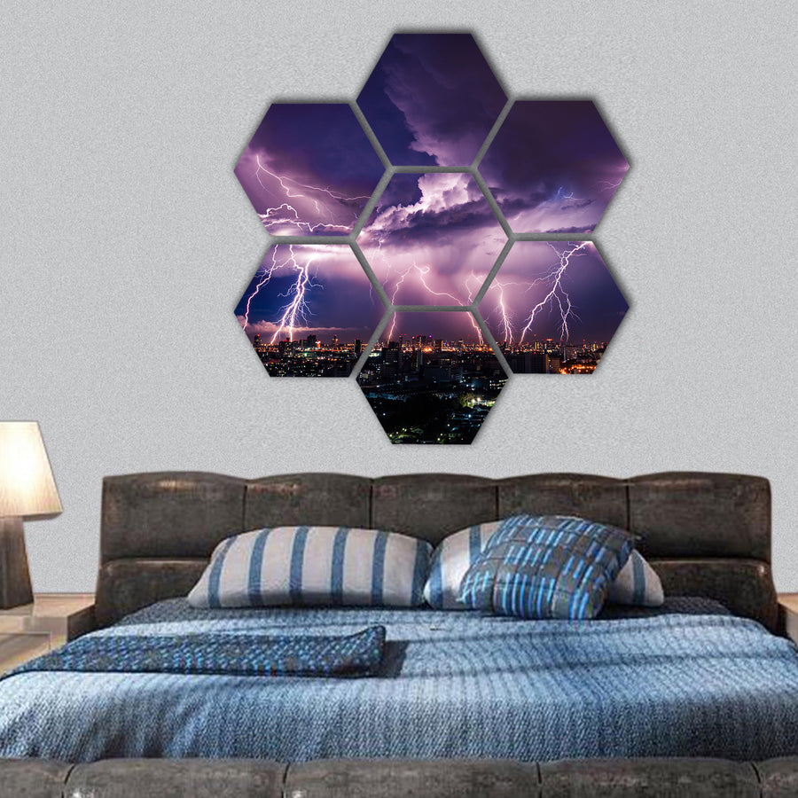 Lightning storm over city in purple light hexagonal canvas wall art