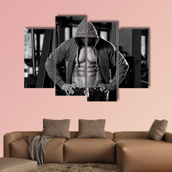 Portrait of a Physically fit Man in Hoodie Showing His Six Pack wall art