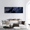 Wolf in silhouette to thunderstorm panoramic canvas wall art