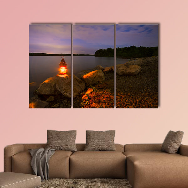 Blue Springs Lake located outside of Kansas City, night with a lantern glowing light Multi panel canvas wall art