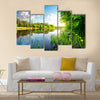 Trees by calm river in the morning Multi Panel Canvas Wall Art