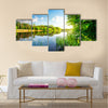 Trees by calm river in the morning Multi Panel Canvas Wall Art