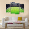 Grass tennis court and stadium full of spectators Multi panel canvas wall art