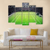 Grass tennis court and stadium full of spectators Multi panel canvas wall art