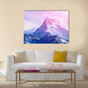 Beautiful cloudy sunrise in the mountains with snow ridge Multi panel canvas wall art