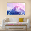 Beautiful cloudy sunrise in the mountains with snow ridge Multi panel canvas wall art