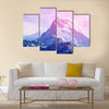 Beautiful cloudy sunrise in the mountains with snow ridge Multi panel canvas wall art