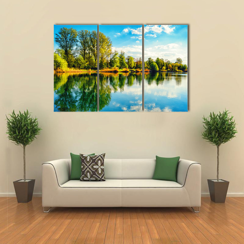 Tranquil landscape at a lake, with the vibrant sky multi panel canvas wall art