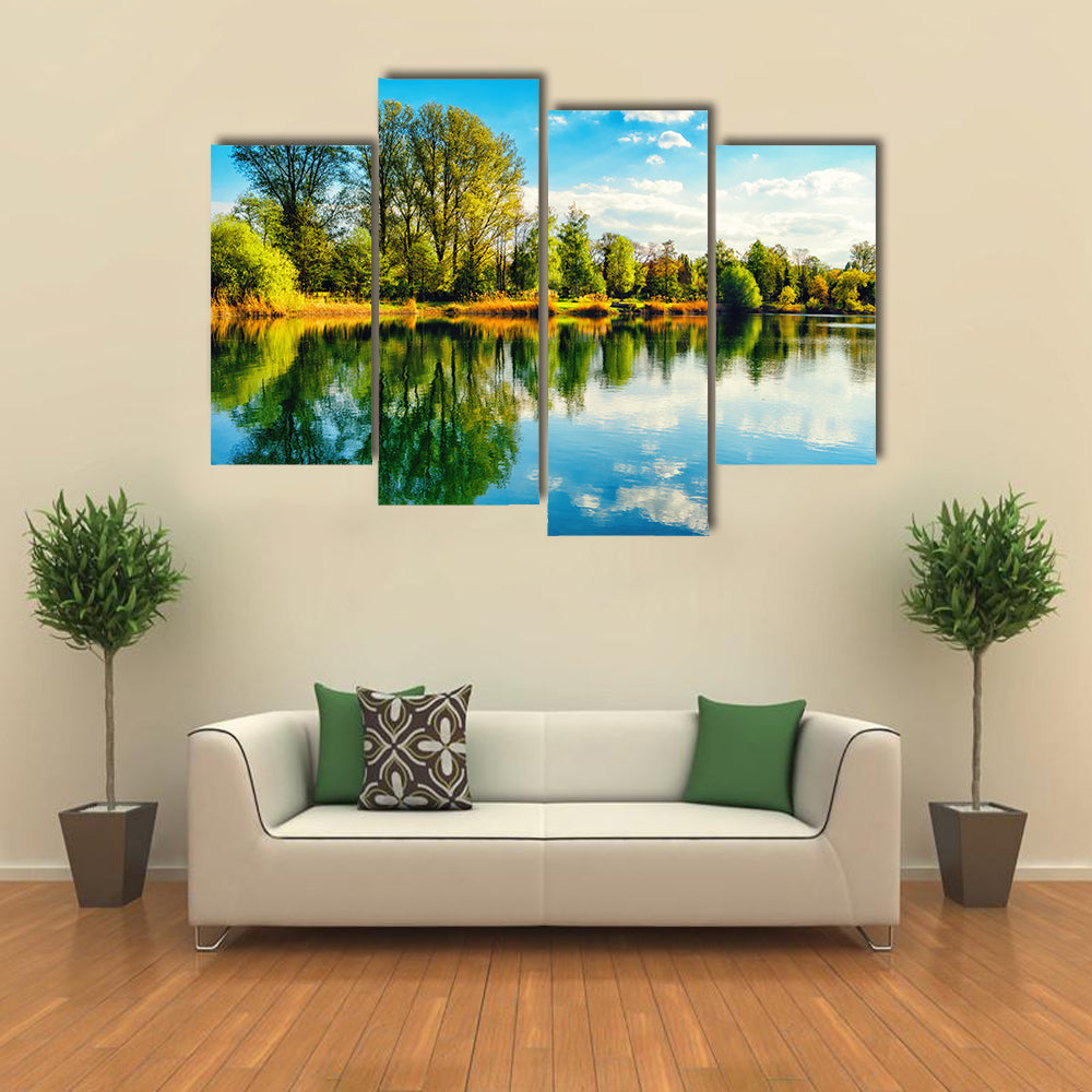 Tranquil landscape at a lake, with the vibrant sky multi panel canvas wall art
