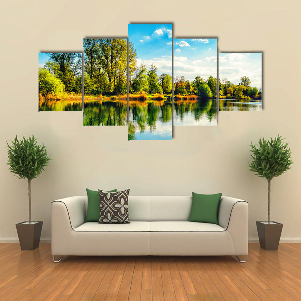 Tranquil landscape at a lake, with the vibrant sky multi panel canvas wall art