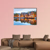 Night city view of Amsterdam, the Netherlands with Amstel River multi panel canvas wall art