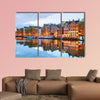 Night city view of Amsterdam, the Netherlands with Amstel River multi panel canvas wall art