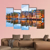 Night city view of Amsterdam, the Netherlands with Amstel River multi panel canvas wall art