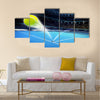 Flying tennis ball on a blue court Multi panel canvas wall art