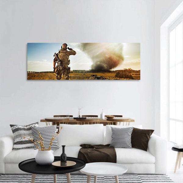 Soldier with the rifle is looking at the smoke under the city panoramic canvas wall art