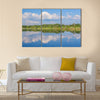 Calm beautiful rural landscape with a lake, Sweden multi panel canvas wall art