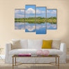 Calm beautiful rural landscape with a lake, Sweden multi panel canvas wall art