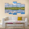 Calm beautiful rural landscape with a lake, Sweden multi panel canvas wall art