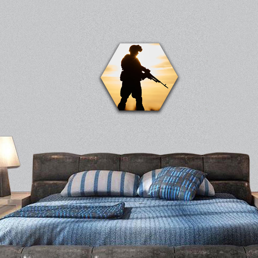 soldier silhouette in uniform with machine gun hexagonal canvas wall art