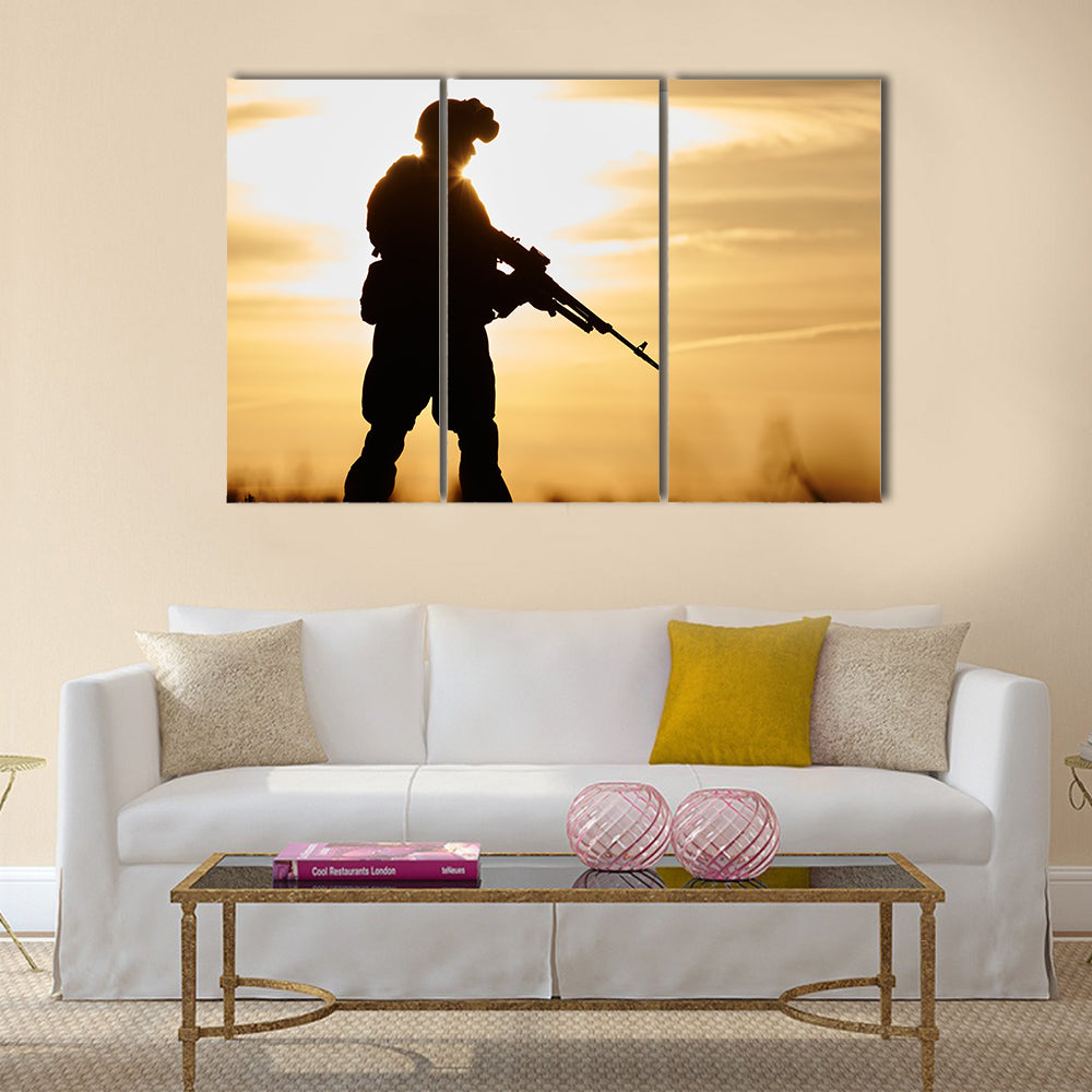Military soldier silhouette in uniform with machine gun multi panel canvas wall art