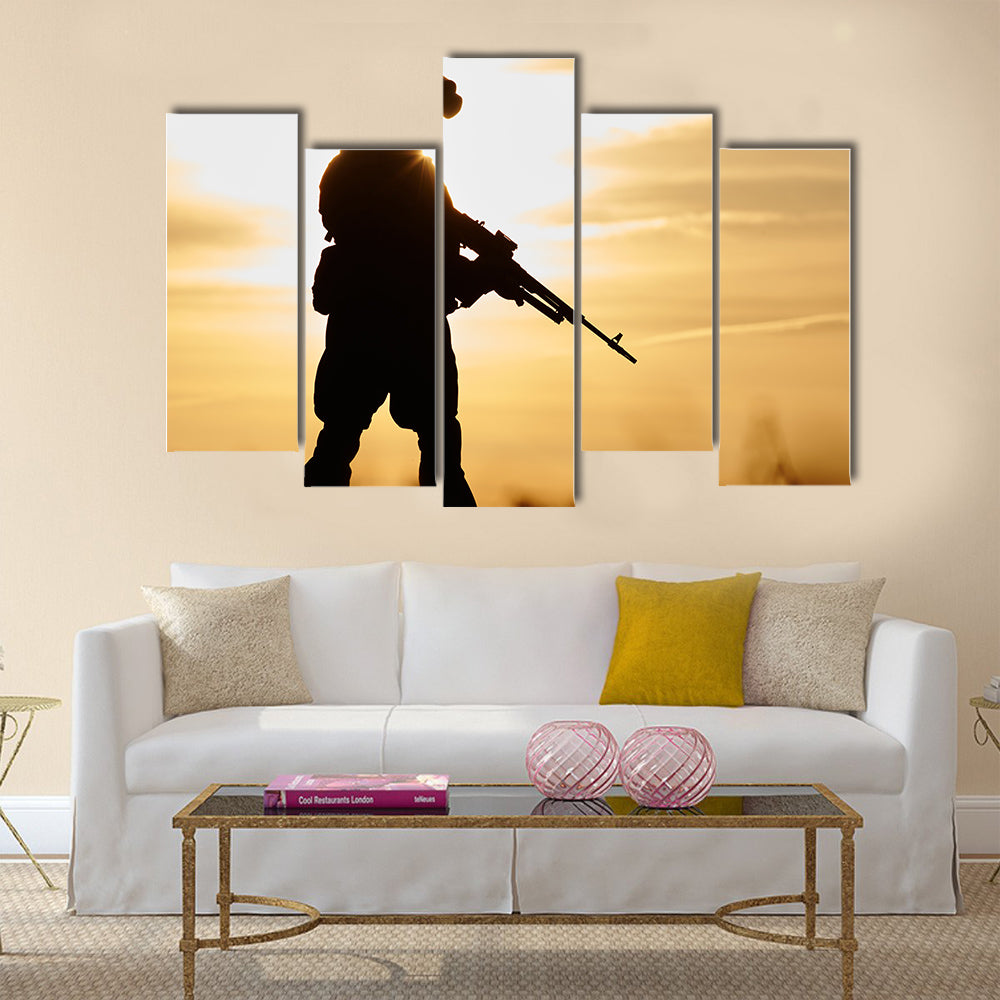 Military soldier silhouette in uniform with machine gun multi panel canvas wall art